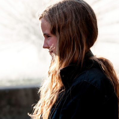 The side profile of a young girl with long hair