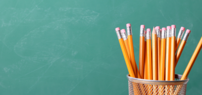 Information Close up of a container full of pencils