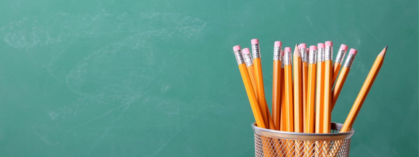 Close up of a container full of pencils