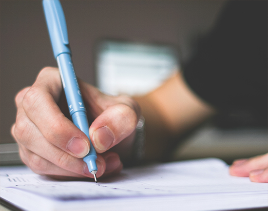 close up of someone writing