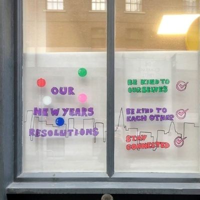 A image of a window display with new years resolutions