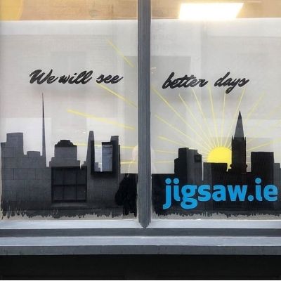 A image of a window display with the words we will see better days