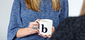 Pic of woman holding a mug