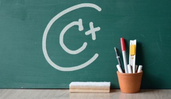 C plus wrote on blackboard in white chalk