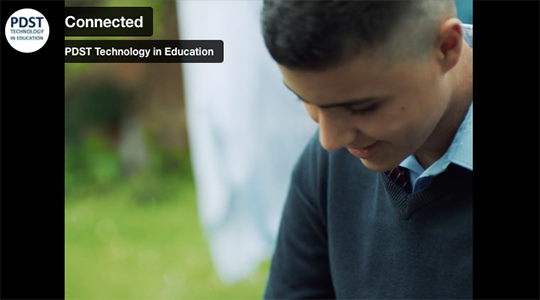 a video still of a young male looking at the ground